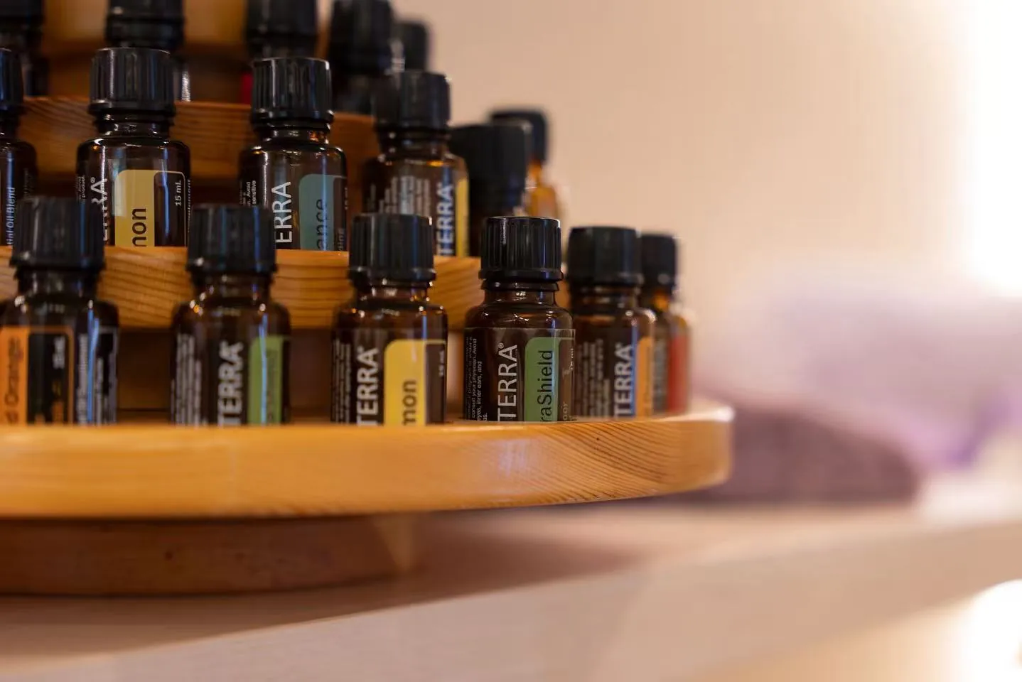 Warm towels, oil and a dressed treatment table prepared for a body treatment at TAO Therapeutic Massage Spa in Vienna, VA